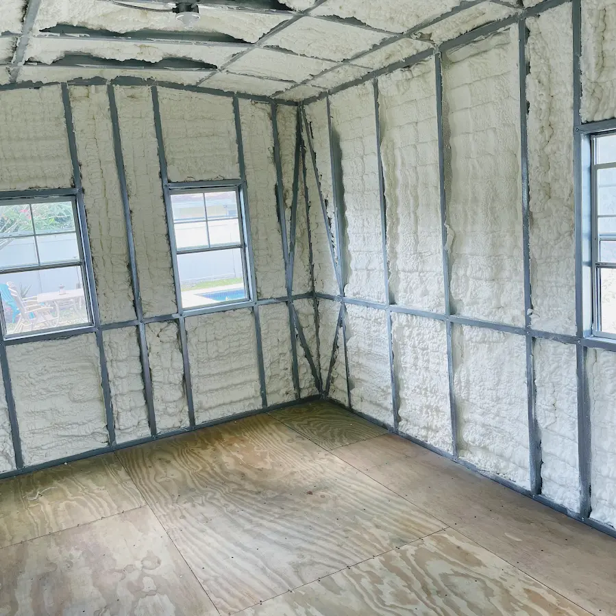Closed-cell spray foam insulation applied to wall cavities in a residential project in Lewiston